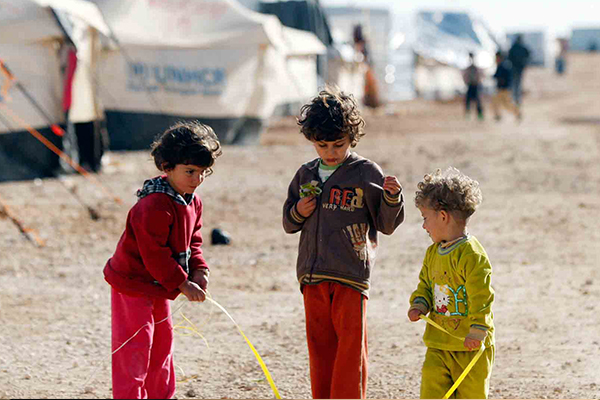 حملة شبابية تركية لتأمين الكساء للأطفال السوريين
